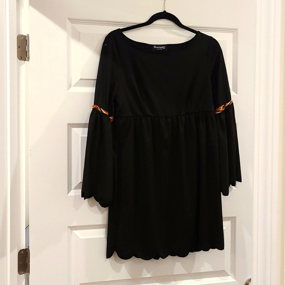 Bell sleeved black dress